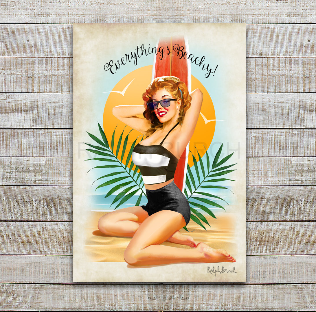 Everything's Beachy Bahing Suit Pin Up sitting on a beach with the Sun and Surfboard behind her.