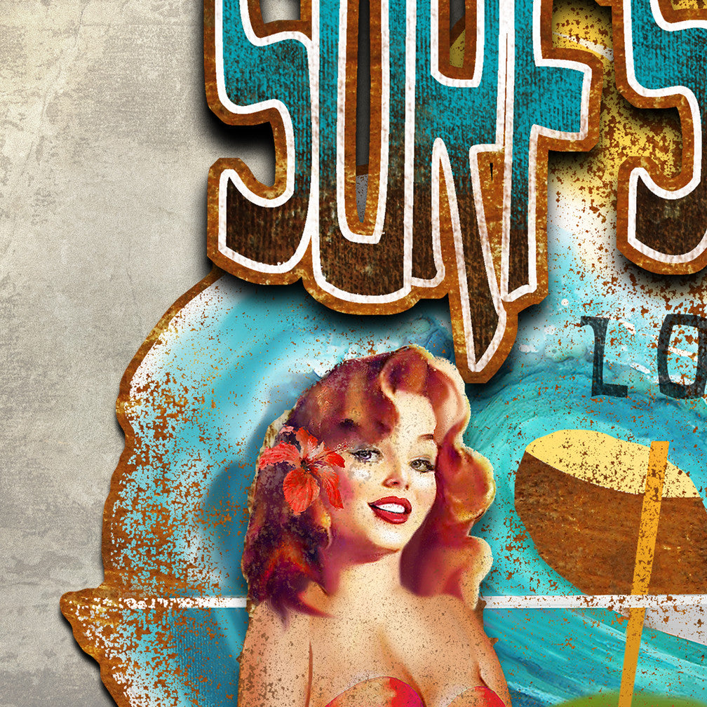 Closeup of a Metal Wall Art called Surf's Up Lounge show the background layer of a cocktail glass with an olive, wave, sun, surfboard and the word Lounge. Attached to the background are the words Surf's Up and also a pin up girl in a bikini with a flower in her hair by Ralph Burch