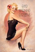 Woman in black lace lingerie with a flower in her hair, sitting on a chair with 'Good Morning Gorgeous' text.
